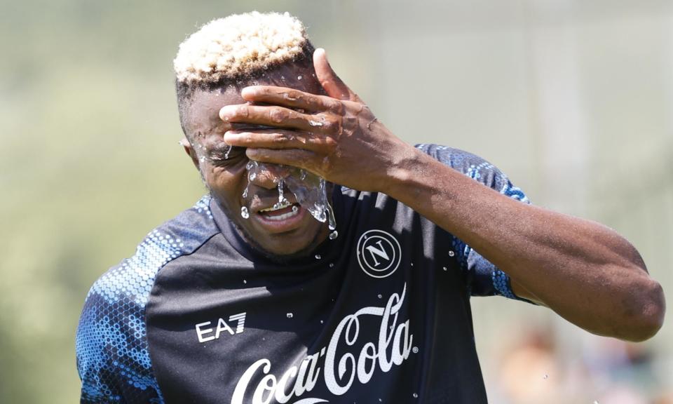 <span>Victor Osimhen tries to keep cool during Napoli’s pre-season training. He has a release clause of about €130m.</span><span>Photograph: Ciro De Luca/NurPhoto/Shutterstock</span>