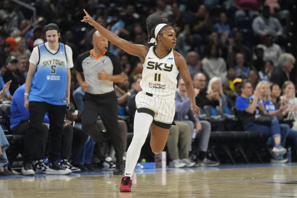 Chicago Sky guard Dana Evans reacts after sinking a 3-point shot against the Seattle Storm during the first half of a WNBA basketball game Tuesday, May 28, 2024, in Chicago. (AP Photo/Erin Hooley)