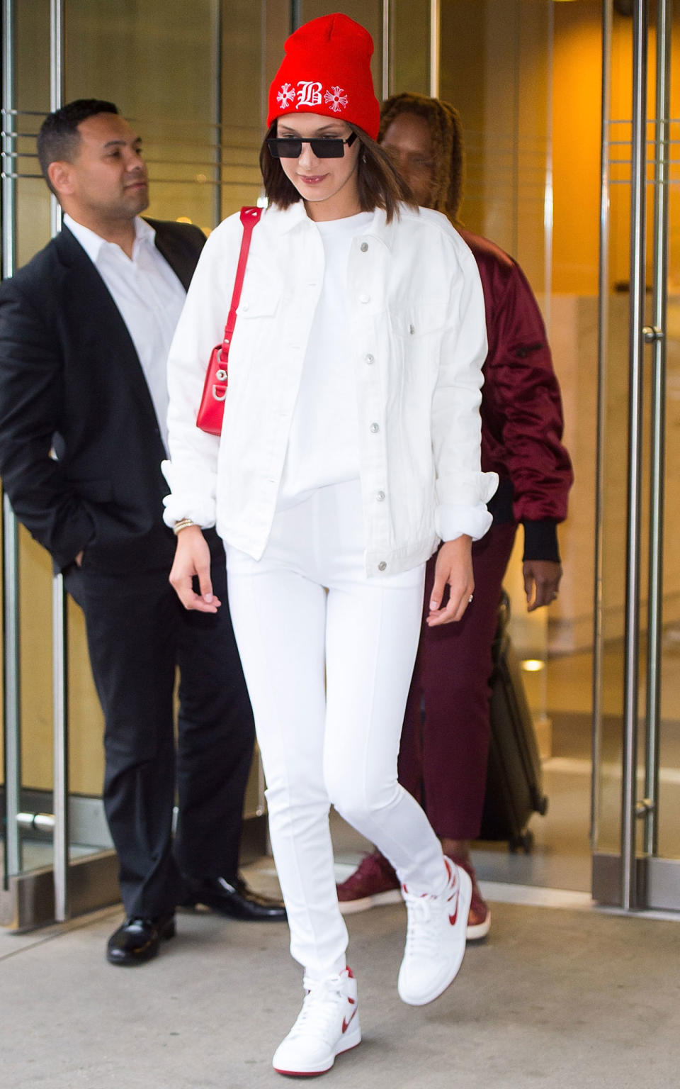 <p><strong>8 June</strong> Bella Hadid was spotted in New York wearing an all-white ensemble with red accents. </p>