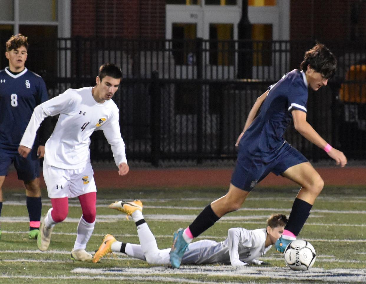 Somerset Berkley's Derrick Camara moves the ball upfield against Case on Wednesday.