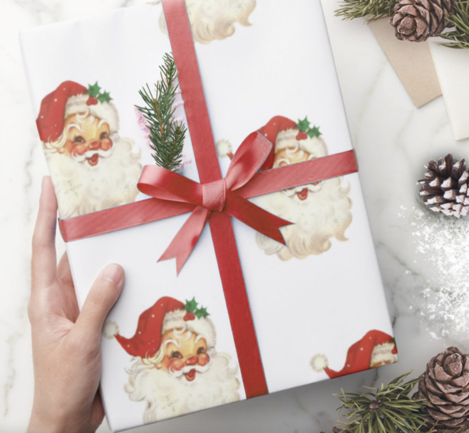 <p><a href="https://go.redirectingat.com?id=74968X1596630&url=https%3A%2F%2Fwww.zazzle.com%2Fretro_santa_face_christmas_wrapping_paper-256257070645797730&sref=https%3A%2F%2Fwww.thepioneerwoman.com%2Fholidays-celebrations%2Fgifts%2Fg41544243%2Fbest-christmas-wrapping-paper%2F" rel="nofollow noopener" target="_blank" data-ylk="slk:Shop Now;elm:context_link;itc:0;sec:content-canvas" class="link ">Shop Now</a></p><p>Retro Santa Face Wrapping Paper</p><p>zazzle.com</p><p>$12.08</p><span class="copyright">Zazzle </span>