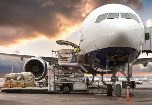 <span class="caption">Supply chains can add a lot to a company's carbon footprint.</span> <span class="attribution"><a class="link " href="https://www.shutterstock.com/image-photo/loading-cargo-on-plane-airport-view-308983271" rel="nofollow noopener" target="_blank" data-ylk="slk:By mariakray / Shutterstock;elm:context_link;itc:0;sec:content-canvas">By mariakray / Shutterstock</a></span>