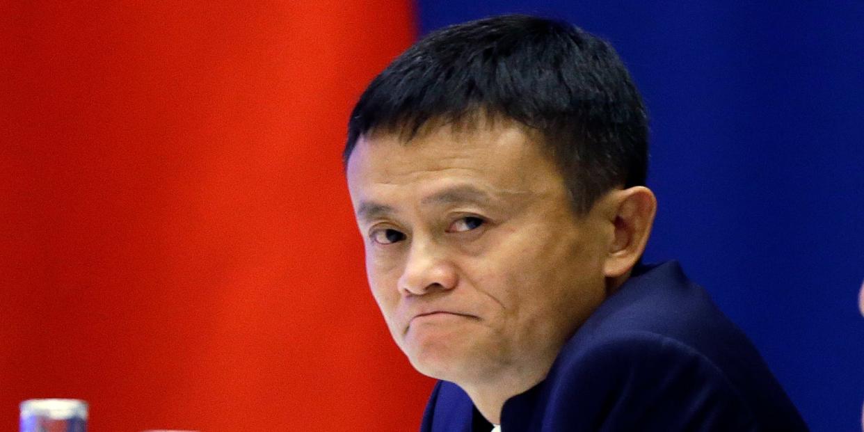 Jack Ma, CEO of Alibaba listens as Chinese President Xi Jinping speaks at a U.S.-China business roundtable, comprised of U.S. and Chinese CEOs on September 23, 2015, in Seattle, Washington.