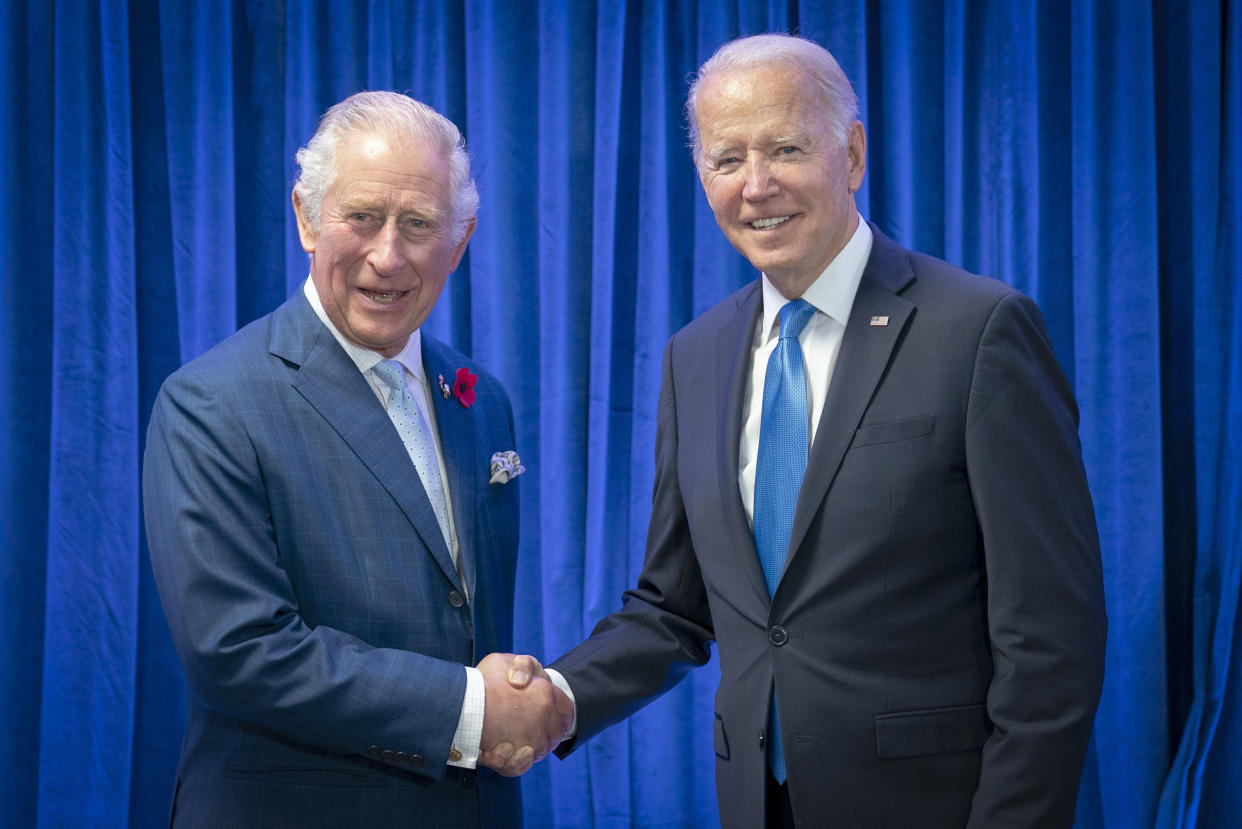 Britain's then-Prince Charles greets President Biden ahead of their bilateral meeting during the Cop26 summit at the Scottish Event Campus (SEC) in Glasgow, Scotland, Nov. 2, 2021. (Jane Barlow/Pool Photo via AP, File)