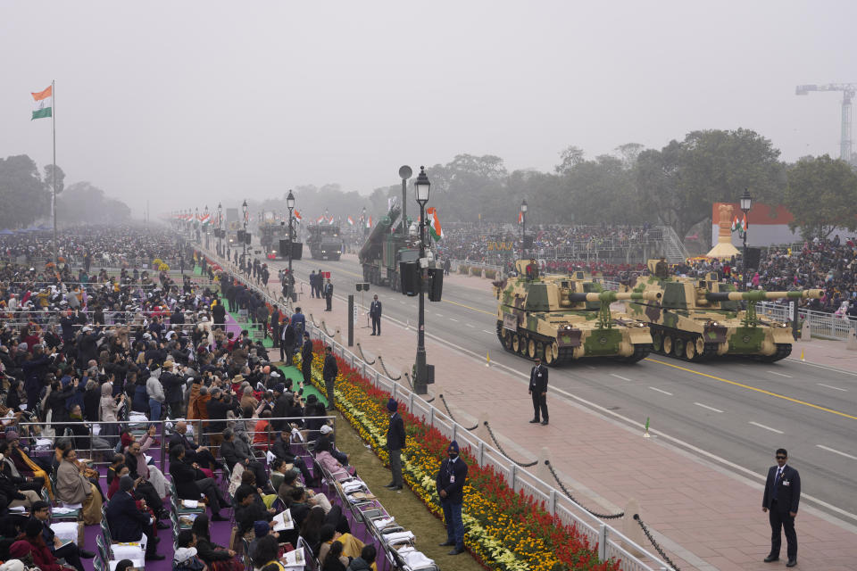 Indian defence forces march through the ceremonial Kartaya Path boulevard during India's Republic Day celebrations in New Delhi, India, Thursday, Jan. 26, 2023. Tens of thousands of people shed COVID-19 masks but faced morning winter chill and mist at a ceremonial parade in the Indian capital on Thursday showcasing India's defense capability and cultural and social heritage on a long revamped marching ceremonial boulevard from the British colonial rule.(AP Photo/Manish Swarup)