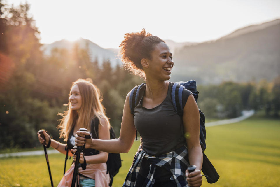 Candid Portrait of Female Friends Hiking in Jezersko Valley (AzmanJaka / Getty Images)