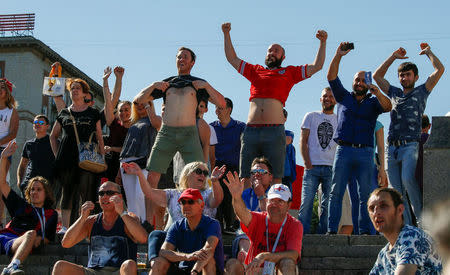 Soccer Football - FIFA World Cup - Group G - Tunisia v England - Volgograd, Russia - June 17, 2018 - England fans reacts as they watch the public broadcast at a Fan Fest zone. REUTERS/Gleb Garanich