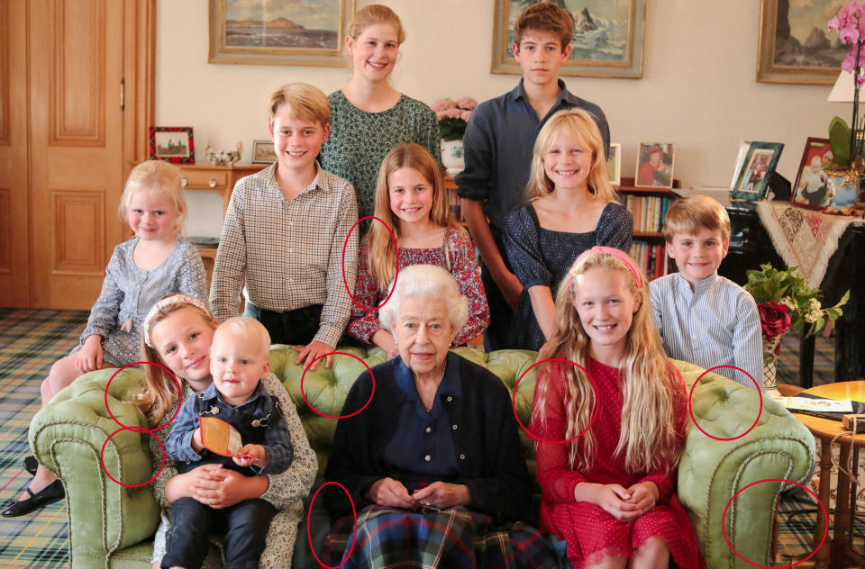 A family portrait of the late Queen Elizabeth II of Great Britain with some of her grandchildren and great-grandchildren (back row, left to right) Lady Louise Mountbatten-Windsor, James, Earl of Wessex, (middle row, left to right ) Lena Tindall, Prince George, Princess Charlotte, Isla Phillips, Prince Louis (front row, left to right) Mia Tindall holding Lucas Tindall and Savannah Phillips, taken at Balmoral Castle, Britain, in this undated image issued by Kensington Palace on April 21, 2023. with indications from Reuters of areas that appear to have been digitally altered by the source.  The Prince and Princess of Wales/Kensington Palace/Handout via REUTERS