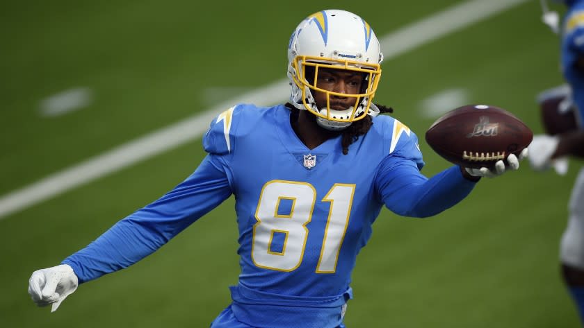 Los Angeles Chargers wide receiver Mike Williams (81) warms up before an NFL football game.