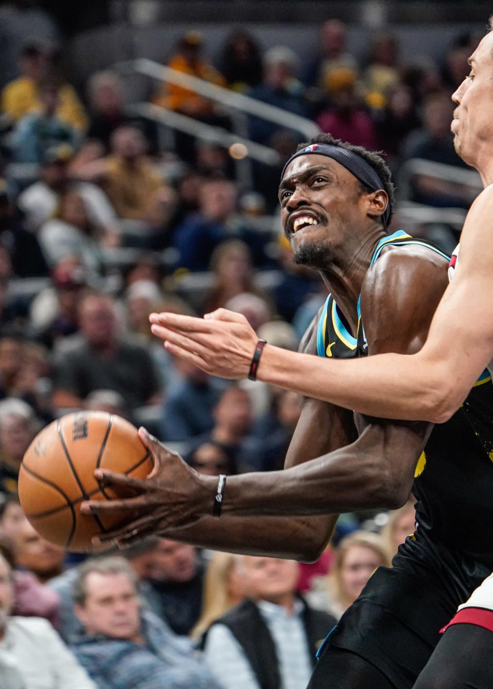 Indiana Pacers forward Pascal Siakam (43) battles for the ball during a game between the Indiana Pacers and the Miami Heat on Sunday, April 7, 2024, at Gainbridge Fieldhouse in Indianapolis.