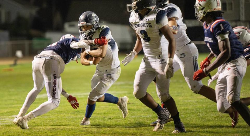 Stone Ridge Christian’s Carson Lund runs the ball during the nonleague game with Modesto Christian at Modesto Christian High School in Salida, Calif., Friday, Sept. 15, 2023.