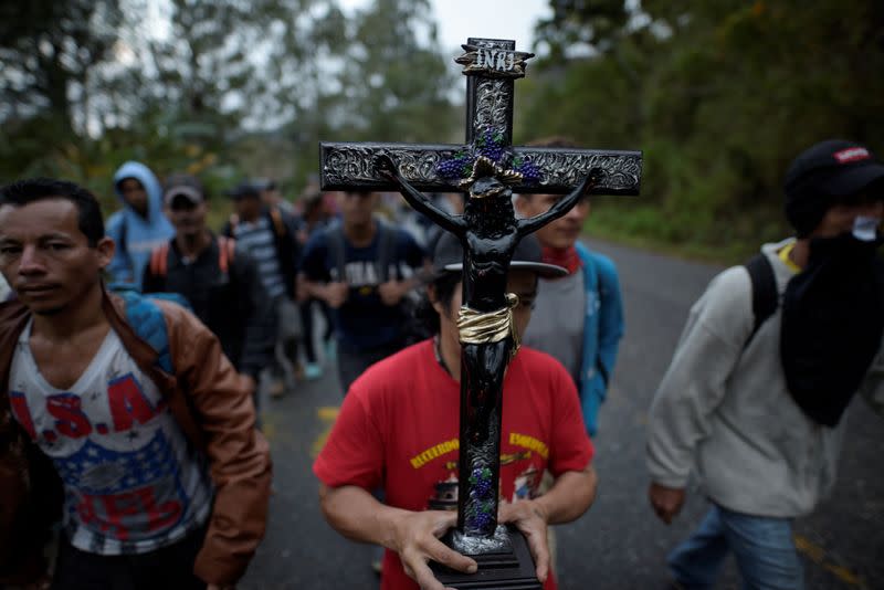 Hondurans take part in a caravan of migrants heading toward the United States, in Chiquimula