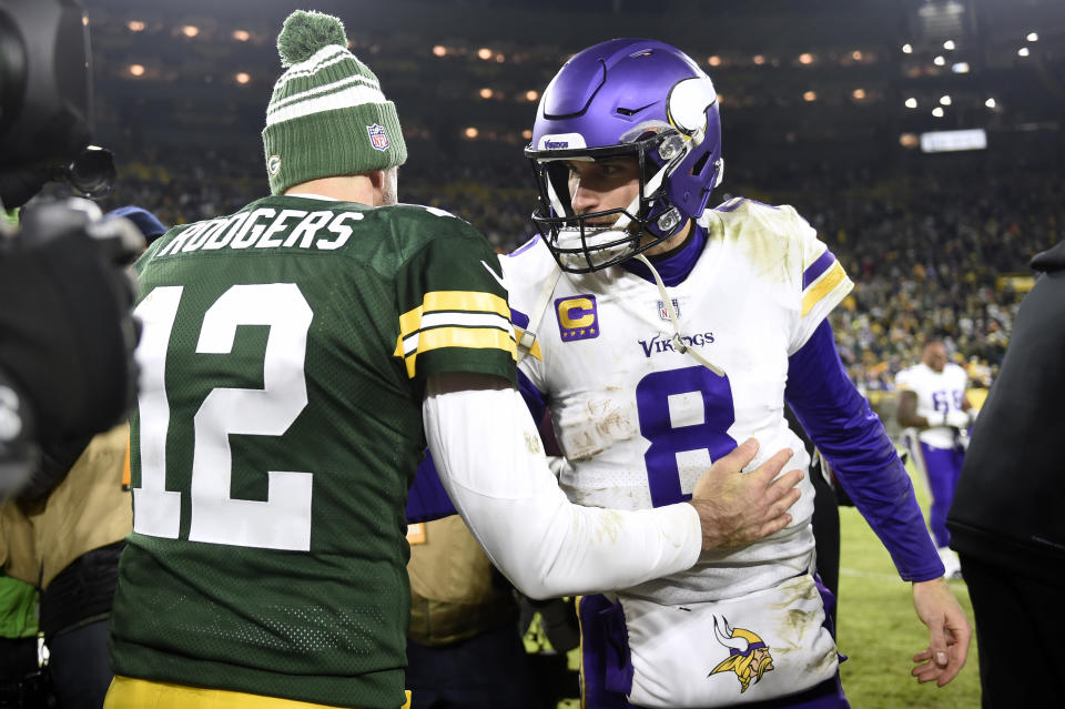 Aaron Rodgers and Kirk Cousins are on new teams (or in Rodgers' case, what amounts to new), and they could swing a big portion of this NFL season.. (Photo by Kayla Wolf/Getty Images)