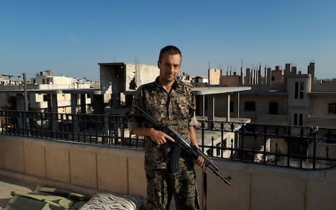 Jamie Janson fighting in northern Syrian with the YPG - Credit: The Telegraph