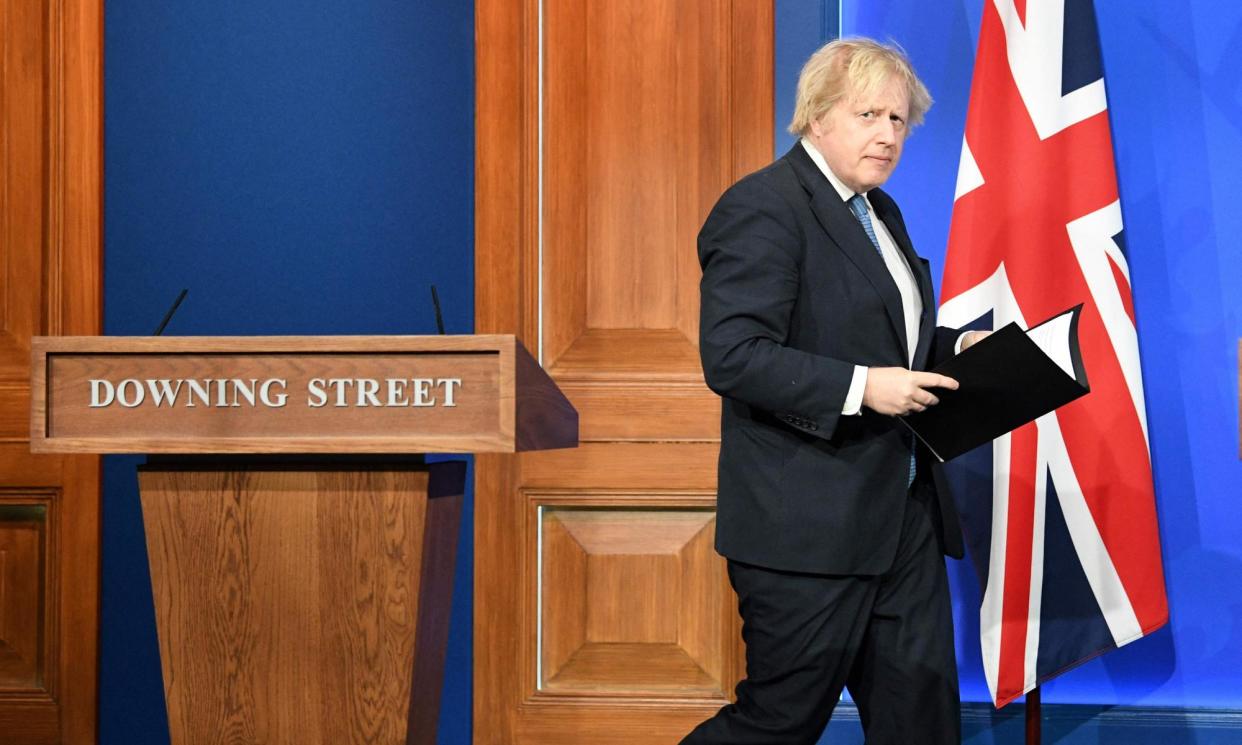 <span>The then prime minister Boris Johnson at a Downing Street press conference, April 2021.</span><span>Photograph: Stefan Rousseau/AFP/Getty Images</span>