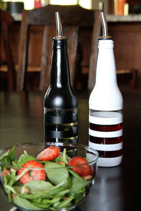 <div class="caption-credit"> Photo by: Ardor</div><div class="caption-title">Soda Bottle Oil Dispensers</div>Have a stash of old soda or beer bottles? Clean them up, and paint them with stripes to make custom oil and vinegar dispensers! <br> <a href="http://www.babble.com/crafts-activities/upcycled-10-crafts-that-you-can-make-from-trash-and-turn-into-treasure/?cmp=ELP|bbl|lp|YahooShine|Main||031313||Upcycled10CraftsThatYouCanMakeFromTrashAndTurnIntoTreasure|famE|||" rel="nofollow noopener" target="_blank" data-ylk="slk:Get the tutorial at Ardor;elm:context_link;itc:0;sec:content-canvas" class="link "><i>Get the tutorial at Ardor</i></a>