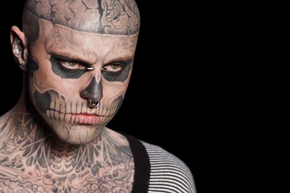 FILE - In this Saturday, June 4, 2011 file photo, Canadian model Rick Genest, aka Zombie Boy, appears on the runway during a fashion show in Rio de Janeiro, Brazil. On Friday, Aug. 3, 2018, the agency that represents Genest, known for his head-to-toe tattoos and his participation in Lady Gaga music video "Born This Way," says he has died. (AP Photo/Felipe Dana)