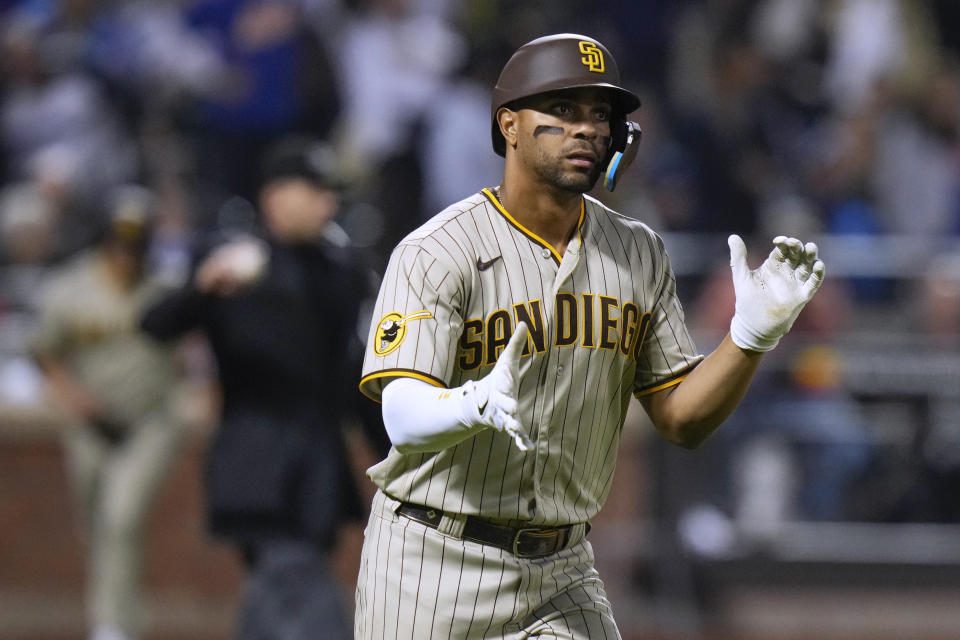 San Diego Padres' Xander Bogaerts celebrates as he runs the bases after hitting a two-run home run against the New York Mets during the ninth inning of a baseball game Tuesday, April 11, 2023, in New York. (AP Photo/Frank Franklin II)