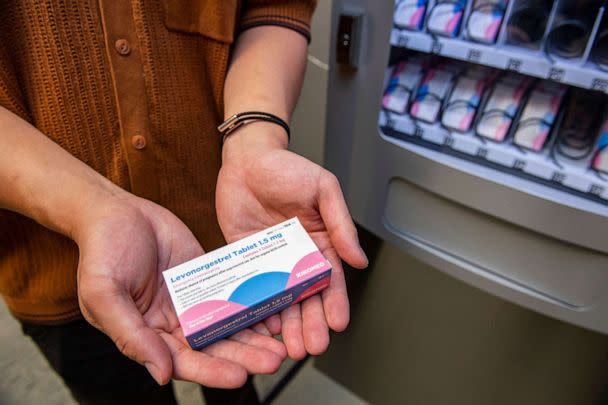 PHOTO: A person holds a carton of the 'morning-after' pill purchased from the Plan-B vending machine that sits in the basement of the student union building on the Boston University Campus in Boston, July 26, 2022.  (Joseph Prezioso/AFP via Getty Images, FILE)