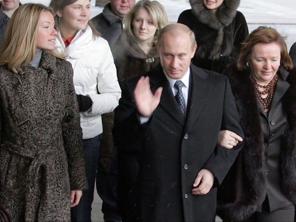 Russian president Vladimir Putin, with his ex-wife Ludmila and their daughter Maria (left) at a Moscow polling station in December 2007 (Alexander Nemenov/AFP/Getty)