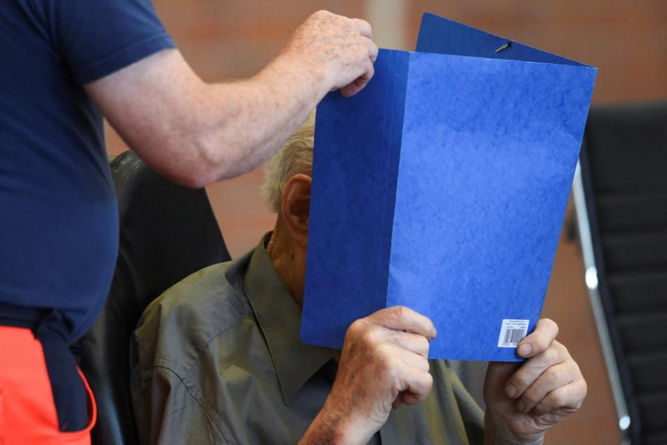 A 101-year-old former security guard of the Sachsenhausen concentration camp appears in the courtroom before his trial verdict  (REUTERS)