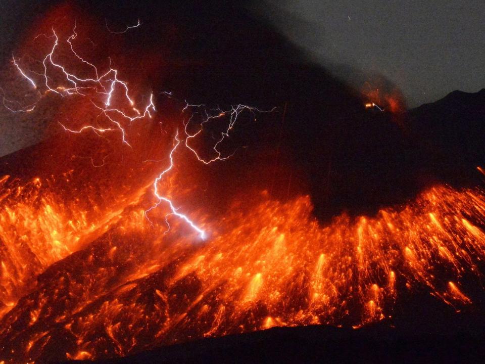 lightning strikes over a Mount Sakurajima, Japan, which is erupting