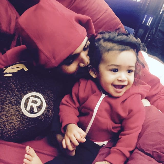 Chris Brown took to Instagram on Thursday to share some incredibly sweet photos of his young daughter Royalty. The first pic shows Brown and his 10-month-old little girl wearing matching red hoodies with the caption, "God has blessed me with my twin. #ROYALTY." He later posted a sweet, solo shot of his young daughter and captioned it simply with a heart. In March, it was reported that Brown had fathered a child with a 31-year-old former model named Nia, who Brown had reportedly known for years. The revelation of the news was cited by many as one of the reasons for Brown's tumultuous break-up with his on-and-off girlfriend, model Karrueche Tran, in March. <strong>VIDEO: Karrueche Tran Responds to Reports That Chris Brown Has a 9-Month-Old Daughter </strong> However, it seems that Brown is on the path of self-improvement. On Monday, Brown posted a photo of himself to Instagram with a lengthy message expressing his desire to "grow into a great man." "Every step I take will only be to greatness. Learning myself everyday and striving to make a difference," Brown wrote. "I can't make anyone love me or like me but for the people who do, you are highly appreciated and valued." These are the first photos Brown has posted of Royalty, and from the looks of it they won't be the last, as he strives to better himself. <strong>NEWS: Yes, Chris Brown Still Considers Himself a Role Model </strong> Last September, ET caught up with Brown to talk about his album <em>X</em>, and the rapper also got candid about his chequered past. Check out Brown's revealing interview in the video below.