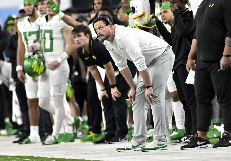 Oregon head coach Dan Lanning looks on during the first half of the Pac-12 championship NCAA college football game against Washington, Friday, Dec. 1, 2023, in Las Vegas. (AP Photo/David Becker)