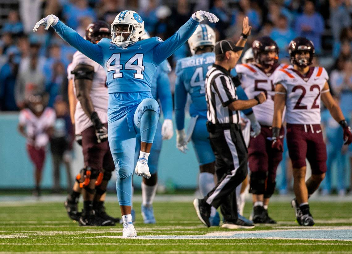 North Carolina’s Randy Caldwell (44) reacts after a sack of Virginia Tech quarterback Jason Brown (1) in the fourth quarter on Saturday, October 1, 2022 at Kenan Stadium in Chapel Hill, N.C.
