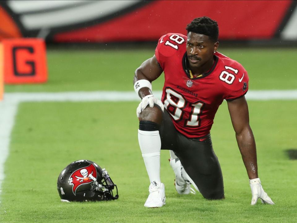 Antonio Brown stretches before a game against the New Orleans Saints.