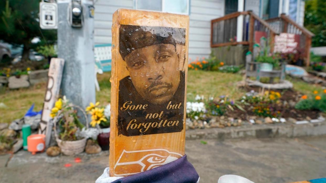 PHOTO: A sign is displayed, May 27, 2021, at a memorial in Tacoma, Wash., where Manuel 'Manny' Ellis died March 3, 2020, after he was restrained by police officers.  (Ted S. Warren/AP)