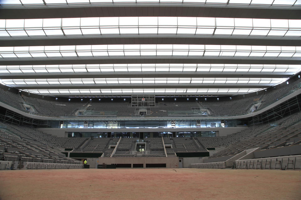 A general view of the Philippe-Chatrier tennis court with its new retractable roof during a media tour at Roland Garros stadium in Paris, Wednesday, May 27, 2020. The French open will moving to September from the end of May because of the outbreak of the COVID-19 disease. (AP Photo/Michel Euler)