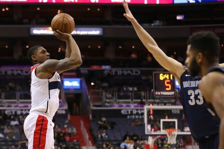 Dec 13, 2017; Washington, DC, USA; Washington Wizards guard Bradley Beal (3) shoots the ball over Memphis Grizzlies center Marc Gasol (33) in the fourth quarter at Capital One Arena. The Wizards won 93-87. Geoff Burke-USA TODAY Sports