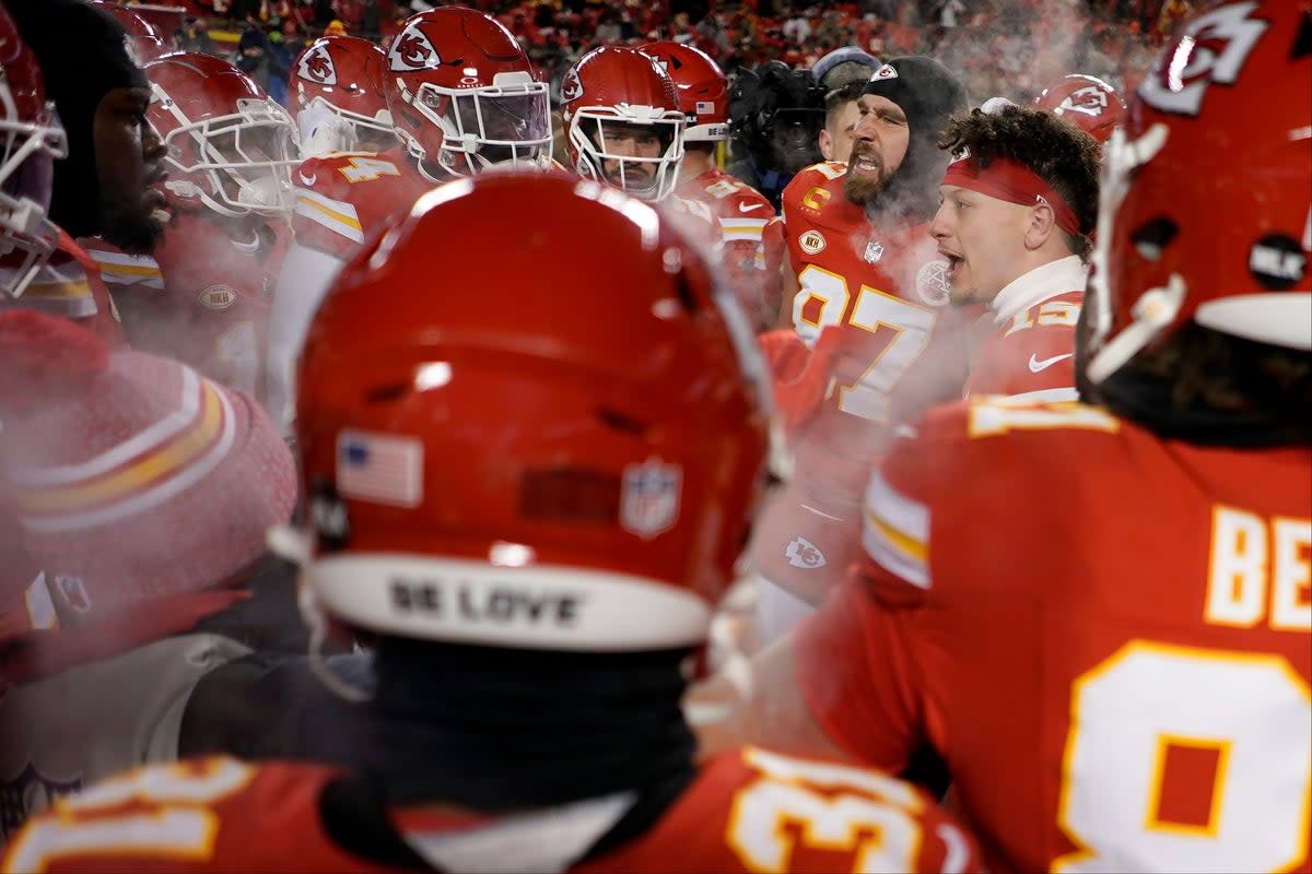 Kansas City Chiefs huddling during their game against the Miami Dolphins on January 13 (AP)