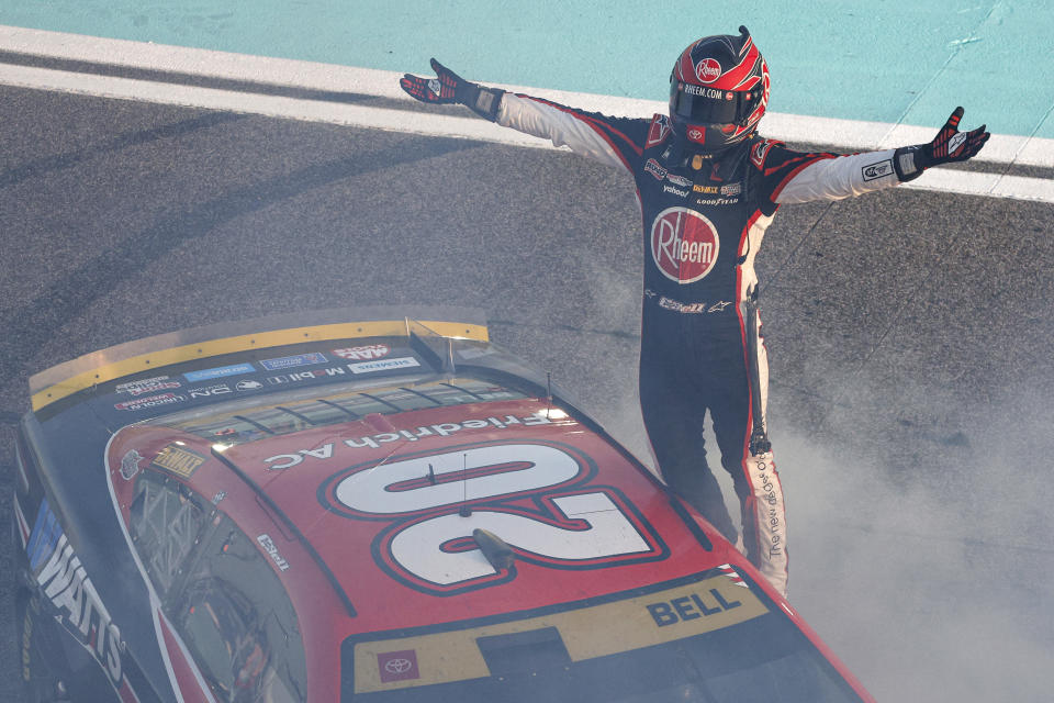 HOMESTEAD, FLORIDA - OCTOBER 22: Christopher Bell, driver of the #20 Rheem/Watts Toyota, celebrates after winning the NASCAR Cup Series 4EVER 400 Presented by Mobil 1 at Homestead-Miami Speedway on October 22, 2023 in Homestead, Florida. (Photo by Sean Gardner/Getty Images)