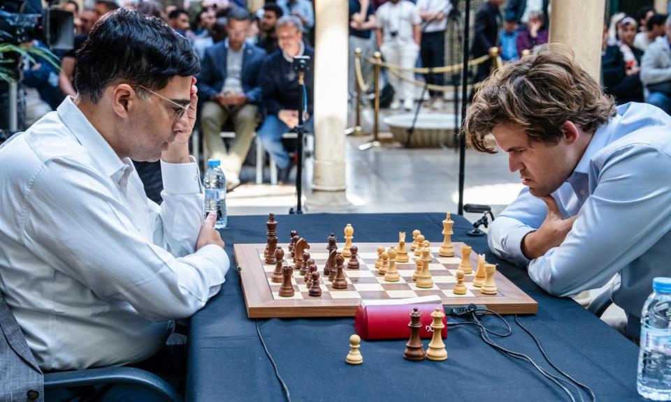 <span>Former world champion Vishy Anand (left) in action against the world No 1, Magnus Carlsen, at Casablanca.</span><span>Photograph: Maria Emelianova</span>