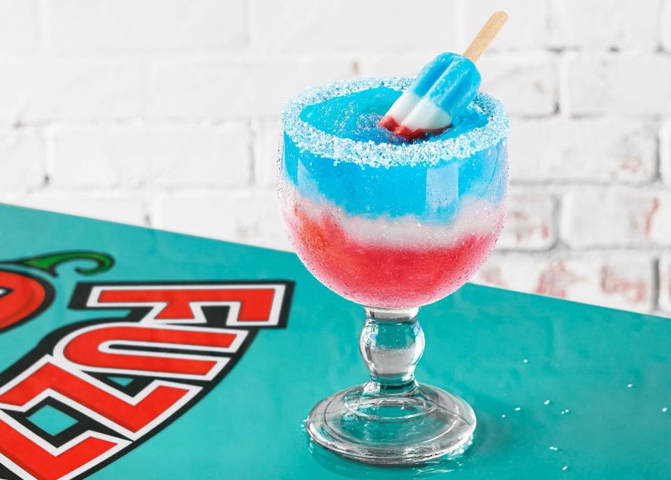 At Fuzzy's Taco Shops, you can toast the Fourth of July with the limited-time Bomb-a-'Rita, a frozen strawberry margarita, made with blue curacao and topped with Bomb Pop.