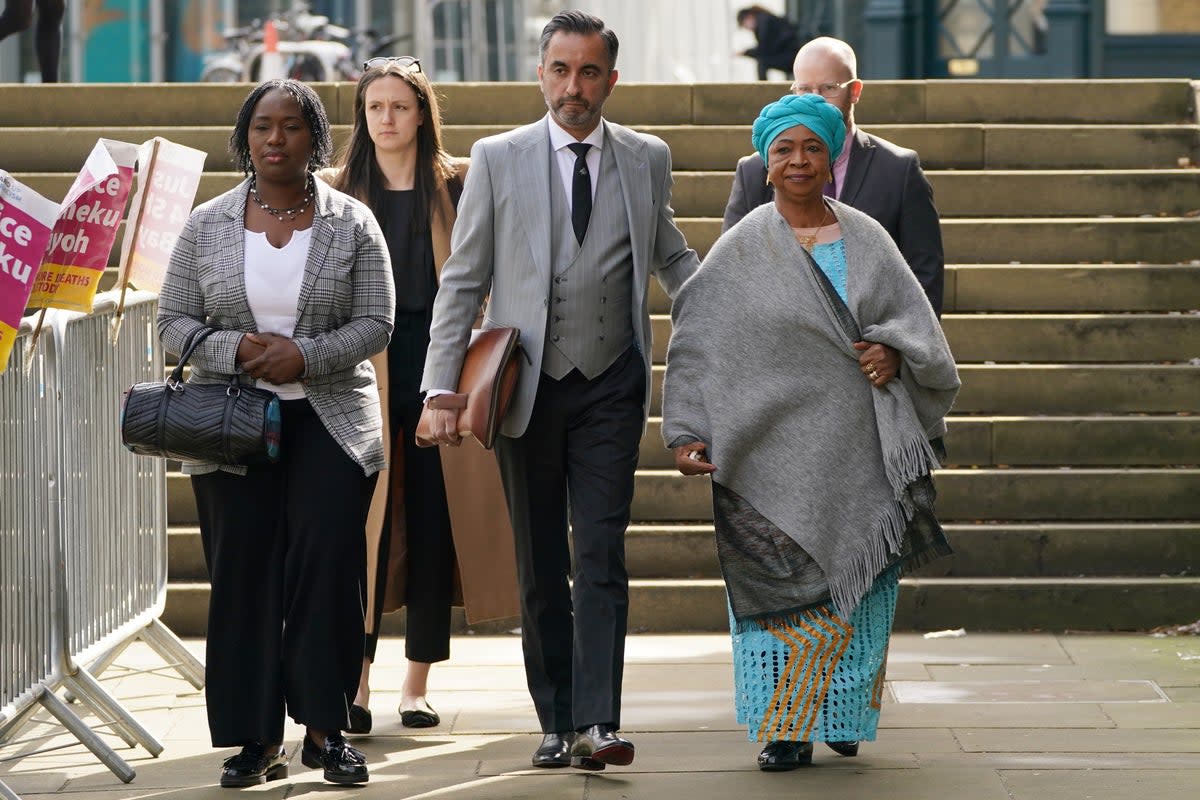 A statement was released by Aamer Anwar, centre, on behalf of the Bayoh family (Andrew Milligan/PA) (PA Wire)