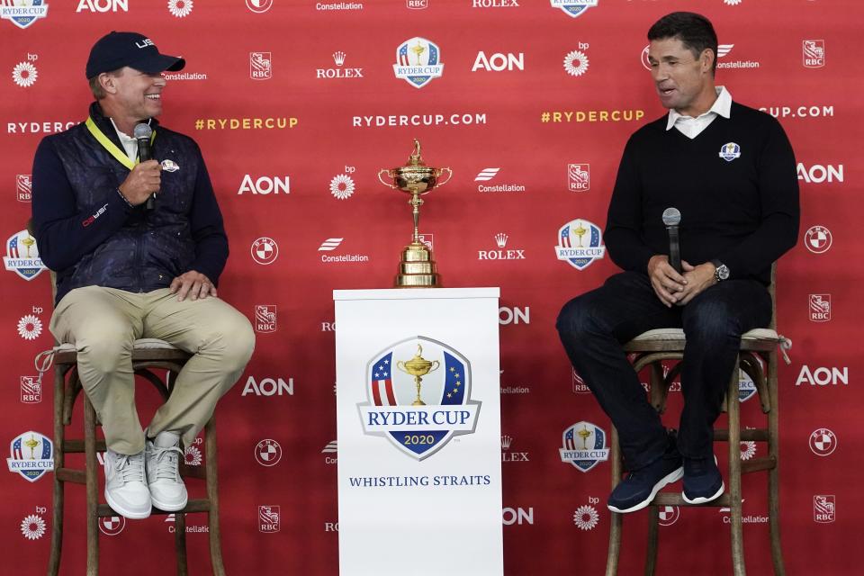 Team USA captain Steve Stricker and Team Europe captain Padraig Harrington answer questions at a new conference for the Ryder Cup at the Whistling Straits Golf Course Monday, Sept. 20, 2021, in Sheboygan, Wis. (AP Photo/Morry Gash)