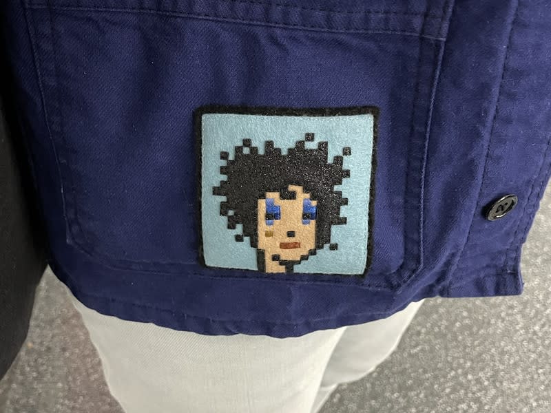 A hand-stitched CryptoPunk.