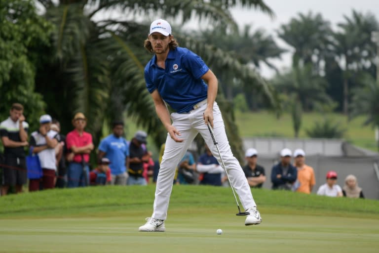 Team Europe's Tommy Fleetwood of England reacts after missing a putt during the singles matches of the 2018 Eurasia Cup, at the Glenmarie Golf and Country club in Shah Alam, outside Kuala Lumpur, on January 14