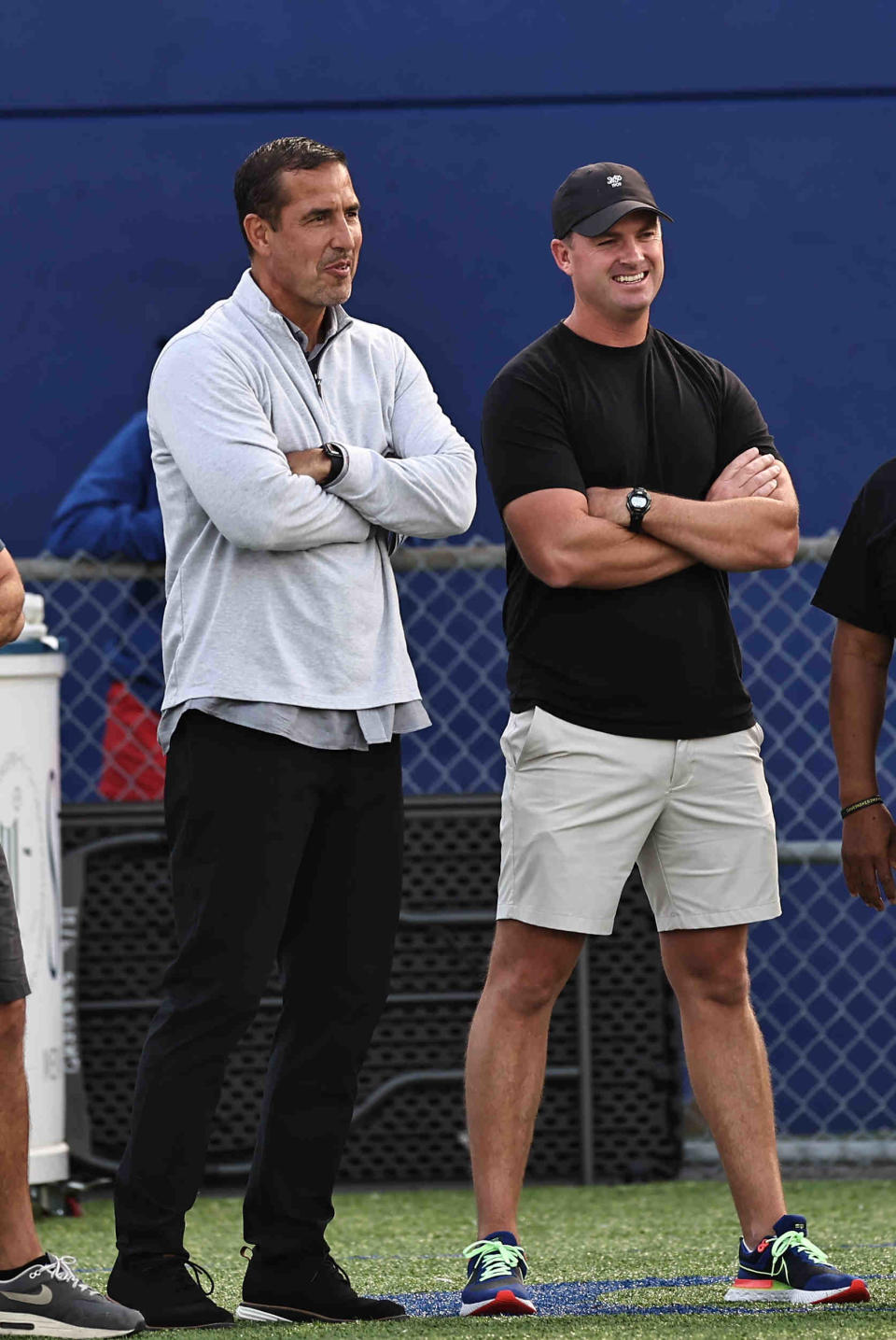 Cincinnati head coach Luke Fickell and Cincinnati Bengals head coach Zac Taylor talk during the game between St. Xavier and Moeller Friday, Sept. 16, 2022.