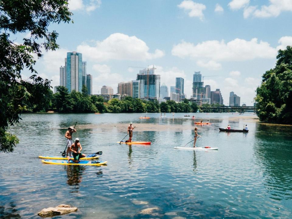 <p>Unsplash</p><p>If you’re coming for the <a href="https://www.aclfestival.com/" rel="nofollow noopener" target="_blank" data-ylk="slk:Austin City Limits;elm:context_link;itc:0;sec:content-canvas" class="link ">Austin City Limits</a> music festival or are in town for <a href="https://www.sxsw.com/" rel="nofollow noopener" target="_blank" data-ylk="slk:SXSW;elm:context_link;itc:0;sec:content-canvas" class="link ">SXSW</a>, your schedule is probably jam-packed. But tack on a few extra days or come back another time to experience the outdoorsy side of Austin. Ride some gravel in nearby <a href="https://tpwd.texas.gov/state-parks/bastrop" rel="nofollow noopener" target="_blank" data-ylk="slk:Bastrop State Park;elm:context_link;itc:0;sec:content-canvas" class="link ">Bastrop State Park</a>, which is laced with 35 miles of trails. If water's more your speed, kayak or SUP with<a href="https://www.rowingdock.com/" rel="nofollow noopener" target="_blank" data-ylk="slk:Rowing Dock;elm:context_link;itc:0;sec:content-canvas" class="link "> Rowing Dock</a> on Lady Bird Lake. About 45 minutes out of town, <a href="https://parks.traviscountytx.gov/parks/reimers-ranch" rel="nofollow noopener" target="_blank" data-ylk="slk:Reimers Ranch Park;elm:context_link;itc:0;sec:content-canvas" class="link ">Reimers Ranch Park</a> has riding, hiking, and climbing. Cool down at a museum like <a href="https://thecontemporaryaustin.org/" rel="nofollow noopener" target="_blank" data-ylk="slk:The Contemporary Austin;elm:context_link;itc:0;sec:content-canvas" class="link ">The Contemporary Austin</a> and, of course, get your fill of barbecue.</p><p><strong>When to Visit: </strong>Dodge the summer heat and visit in spring or fall.</p><p><strong>What to Do:</strong> Get a solid swim workout in at one of the country’s most unique pools:<a href="https://www.austintexas.gov/department/barton-springs-pool" rel="nofollow noopener" target="_blank" data-ylk="slk:Barton Springs;elm:context_link;itc:0;sec:content-canvas" class="link "> Barton Springs</a>, a three-acre, spring-fed pool that’s open year-round. Robert Redford learned to swim here when he was a kid.</p><p><strong>Where to Stay: </strong>Stay in a Greek Revival-style mansion at <a href="https://hotelella.com/" rel="nofollow noopener" target="_blank" data-ylk="slk:Hotel Ella;elm:context_link;itc:0;sec:content-canvas" class="link ">Hotel Ella</a>, which has a courtyard pool and Texas modernist art adorning the walls. Located in the 2nd Street District, Austin Proper is a stylish place packed with amenities, like Teslas you can borrow, a spa, plus a fifth-floor pool with an accompanying bar serving small-batch tequila and mezcal alongside lobster quesadillas.</p><p><strong>Where to Eat: </strong>Enjoy beautifully charred Neapolitan pies with wet centers that come out of 900-degree ovens at <a href="https://www.bufalinapizza.com/#locations" rel="nofollow noopener" target="_blank" data-ylk="slk:Bufalina Pizza;elm:context_link;itc:0;sec:content-canvas" class="link ">Bufalina Pizza</a>. Order brisket, pinto beans, banana pudding and anything else that makes your barbecue-loving heart flutter at <a href="https://terryblacksbbq.com/austin/" rel="nofollow noopener" target="_blank" data-ylk="slk:Terry Black's Barbecue;elm:context_link;itc:0;sec:content-canvas" class="link ">Terry Black's Barbecue</a>. Agave lovers should head to <a href="https://whislersatx.com/" rel="nofollow noopener" target="_blank" data-ylk="slk:Whisler's;elm:context_link;itc:0;sec:content-canvas" class="link ">Whisler's</a> for smoky, complex mezcals. <a href="https://www.nickelcitybar.com/" rel="nofollow noopener" target="_blank" data-ylk="slk:Nickel City;elm:context_link;itc:0;sec:content-canvas" class="link ">Nickel City</a> is where you’ll find cold beers and espresso martinis on tap.</p>