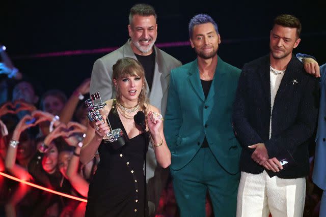 <p>TIMOTHY A. CLARY/AFP via Getty</p> Taylor Swift and Joey Fatone, Lance Bass and Justin Timberlake at the 2023 VMAs