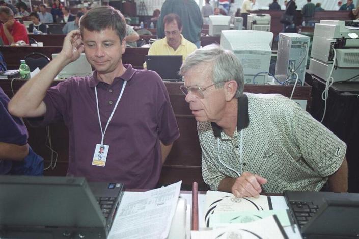 Ron Green Jr. (left) and Ron Green Sr., work in the media village for The Charlotte Observer at the 1999 U.S. Open at Pinehurst. In this week’s debut Golf.Carolinas.com newsletter, Ron Jr. writes about how golf is part of the fabric of the Carolinas, and we dig into the archives for a Ron Green Sr. classic column on Billy Joe Patton.