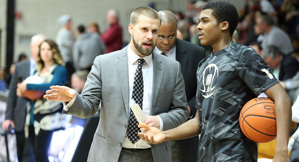 Chris Burns, left, became the first openly gay coach in men's Division I basketball when he came out in a 2015 story with USA TODAY Sports.