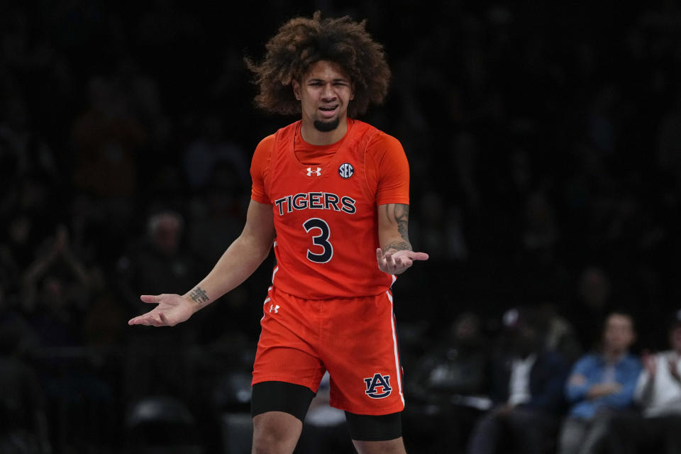 Auburn's Tre Donaldson gestures after making a 3-point shot against Notre Dame during the second half of an NCAA college basketball game in the Legends Classic tournament Thursday, Nov. 16, 2023, in New York. (AP Photo/Frank Franklin II)