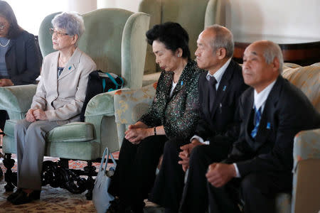 Sakie Yokota (L), mother of Megumi Yokota who was abducted by North Korean agents at age 13 in 1977, and family members of Japanese nationals abducted by North Korean agents, meet U.S. ambassador to Japan William Hagerty (not in the picture) in Tokyo, Japan, April 10, 2018. REUTERS/Kim Kyung-Hoon