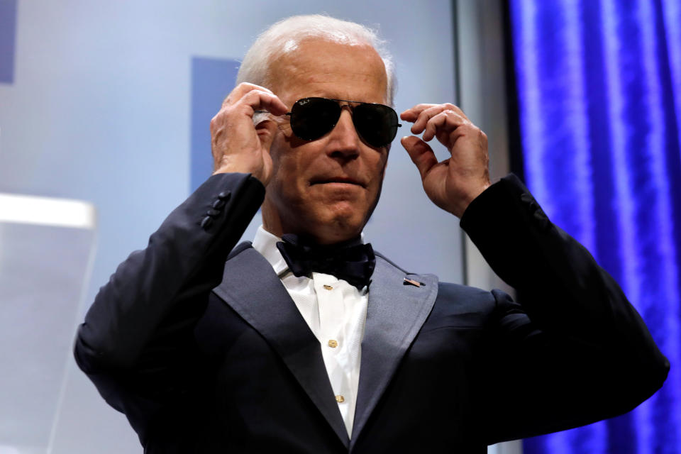 Former U.S. Vice President Joe Biden wears sunglasses at the Human Rights Campaign (HRC) dinner in Washington, U.S., September 15, 2018. REUTERS/Yuri Gripas