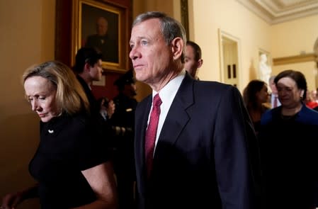 FILE PHOTO: U.S. Supreme Court Chief Justice Roberts departs after President Trump concluded his second State of the Union address to a joint session of the U.S. Congress in Washington